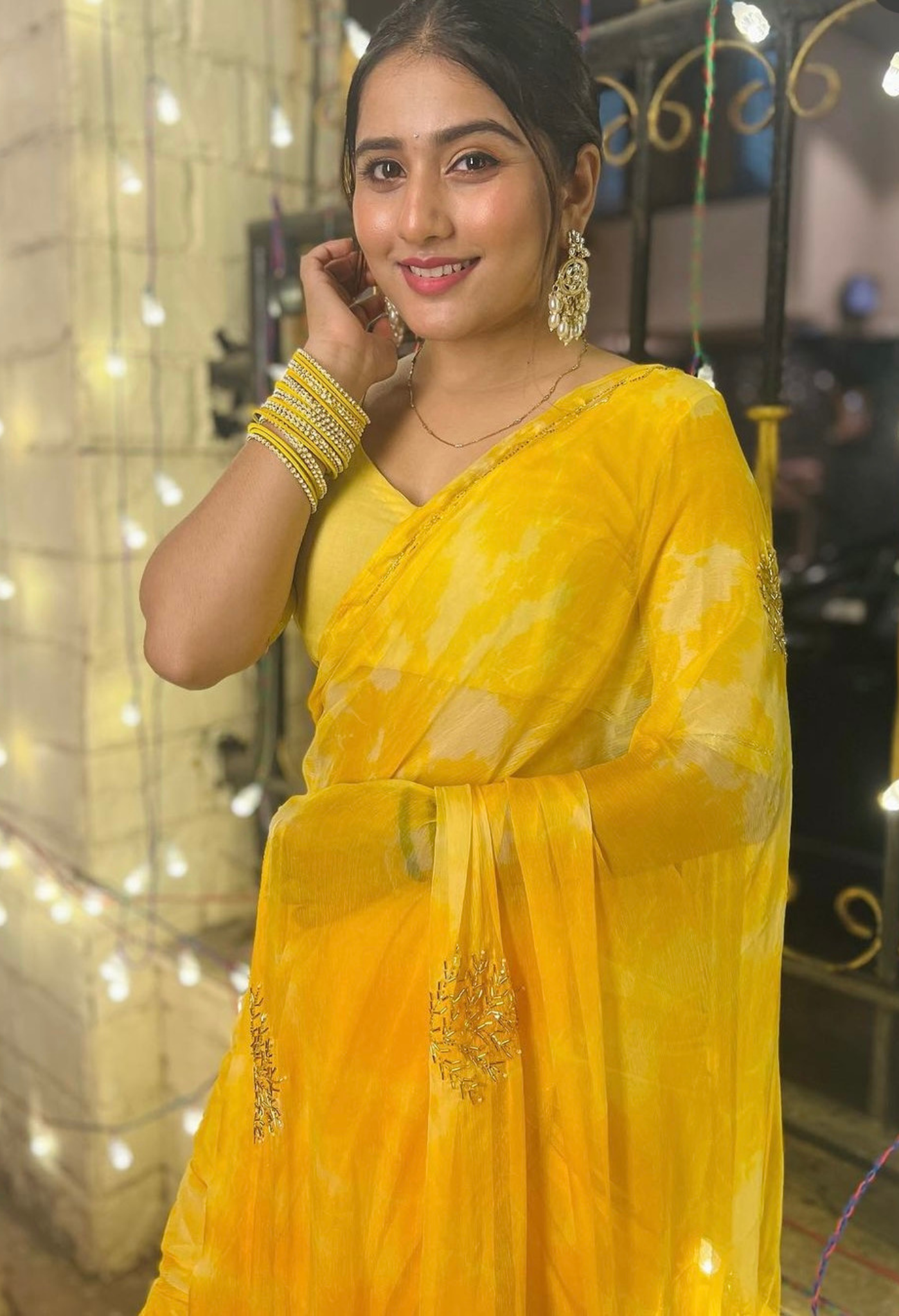 House of Chiffon yellow festive chiffon saree styled for farewell saree occasions, trousseau saree looks, and elegant party wear saree.