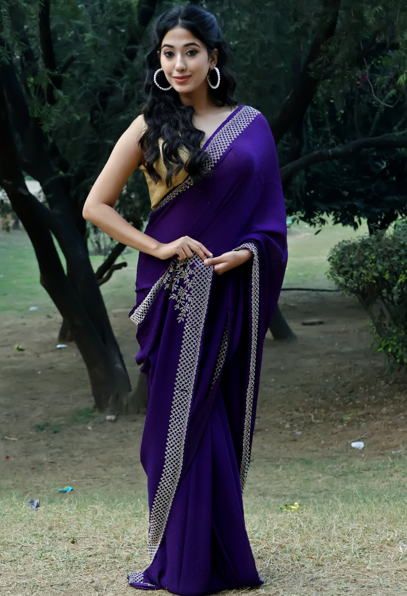 Elegant Rich Purple Swarovski Heavy Embellished chiffon leheriya saree for festive wear, trousseau saree, or farewell saree for timeless pre-wedding collection looks.