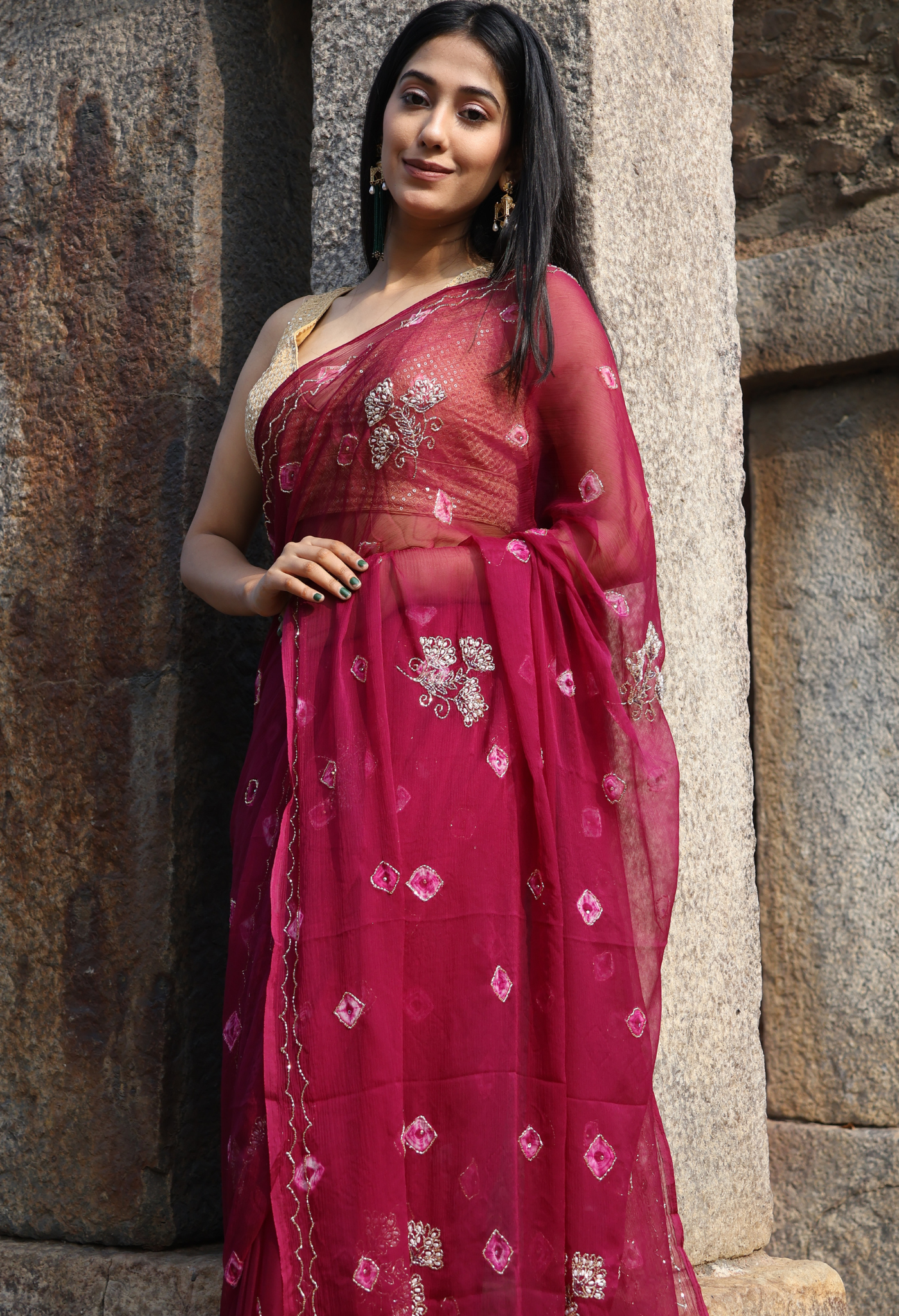 Burgundy Bandhini Embellished chiffon leheriya saree for festive wear, trousseau saree, or farewell saree for timeless pre-wedding collection looks.