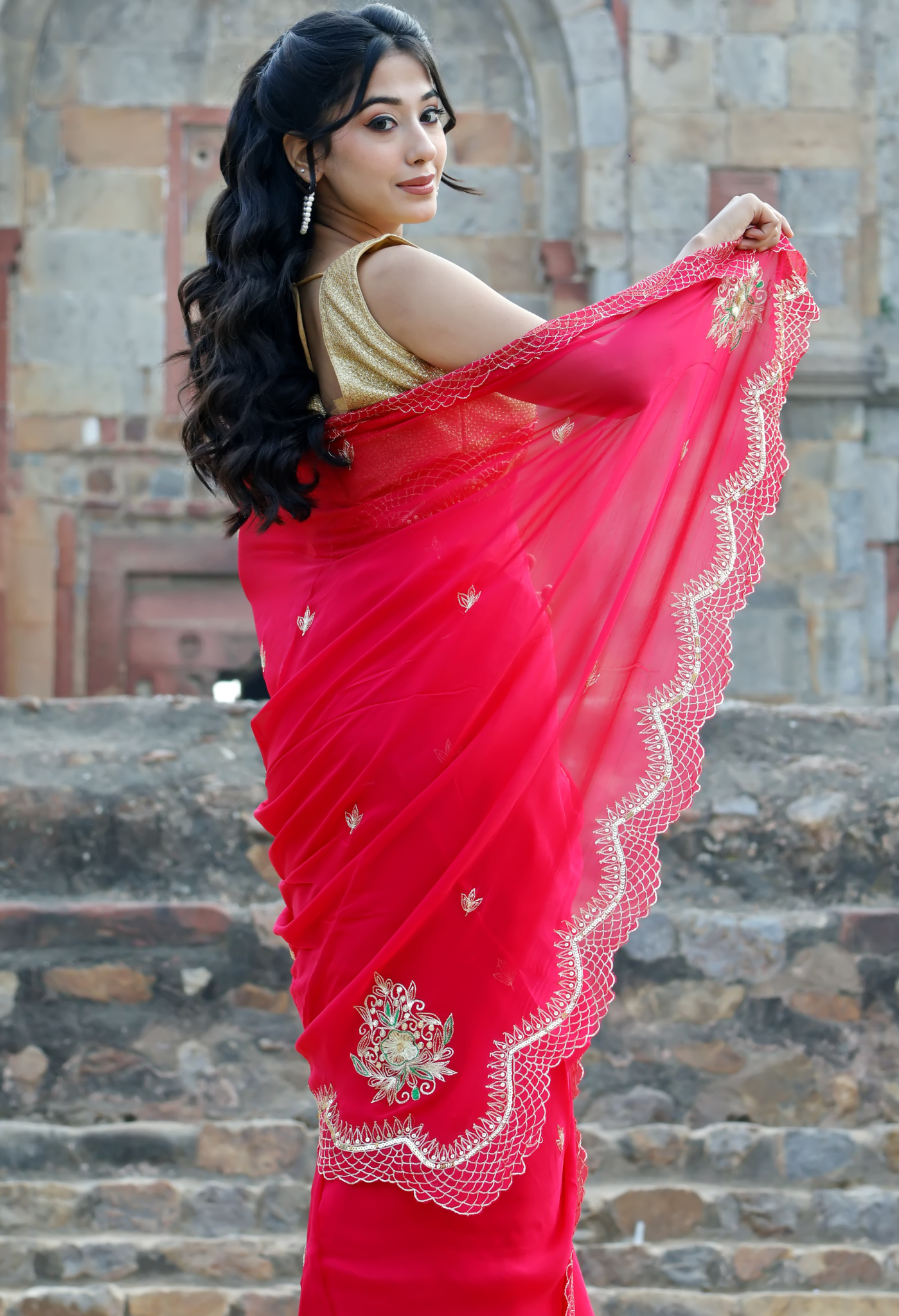 Brink Red Embroidered chiffon saree styled as festive wear, daily wear saree, and party wear saree, a versatile trousseau saree for weddings.