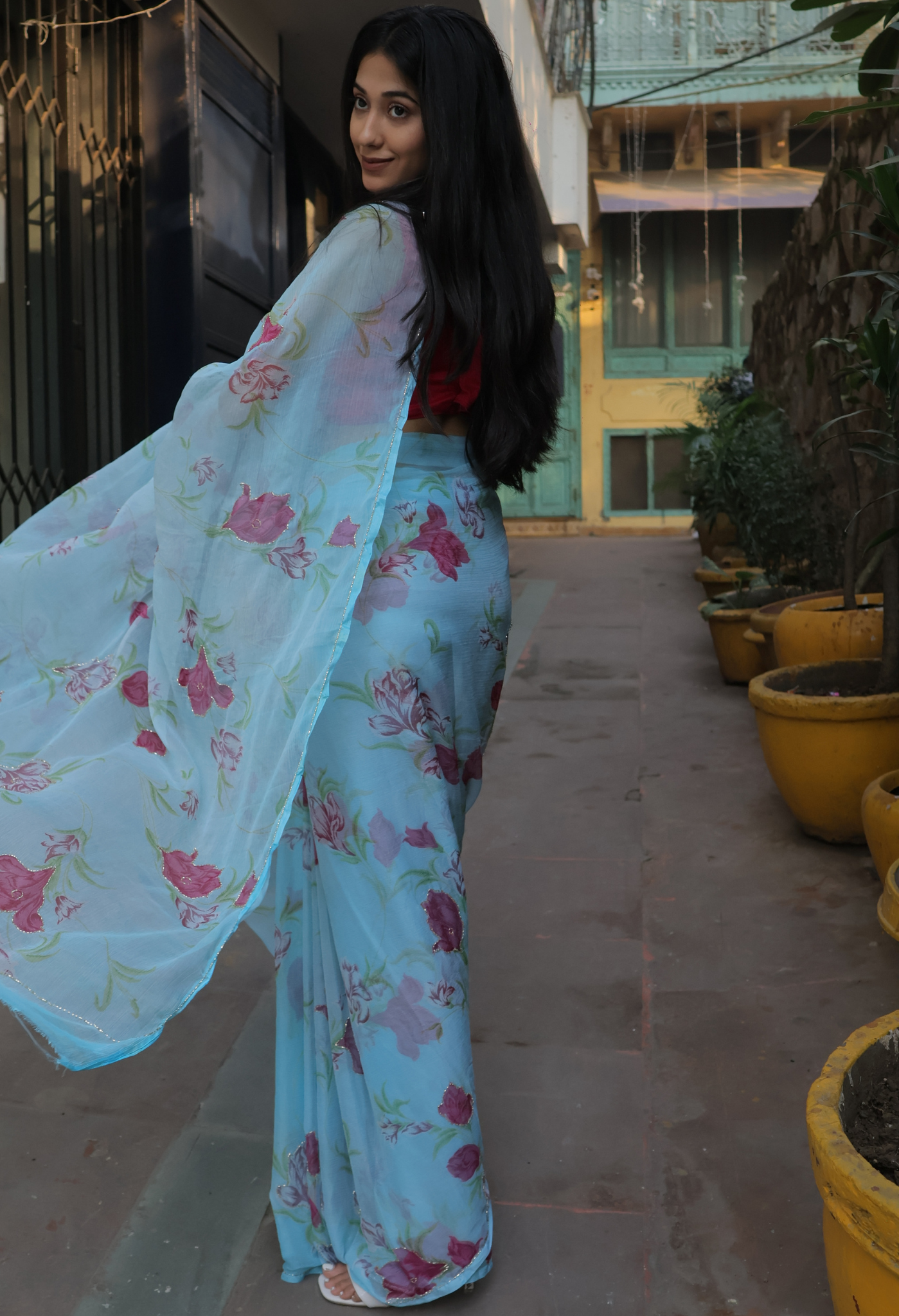 Baby Blue Floral Printed chiffon leheriya saree for festive wear, trousseau saree, or farewell saree for timeless pre-wedding collection looks.