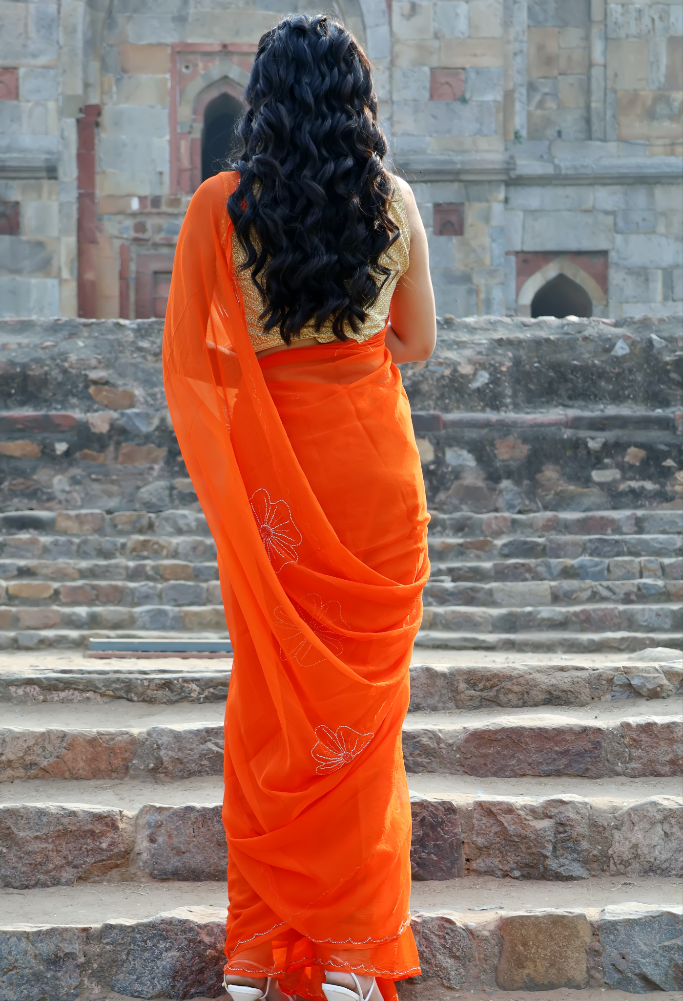 Elegant Princeton Orange Embellished chiffon leheriya saree for festive wear, trousseau saree, or farewell saree for timeless pre-wedding collection looks.