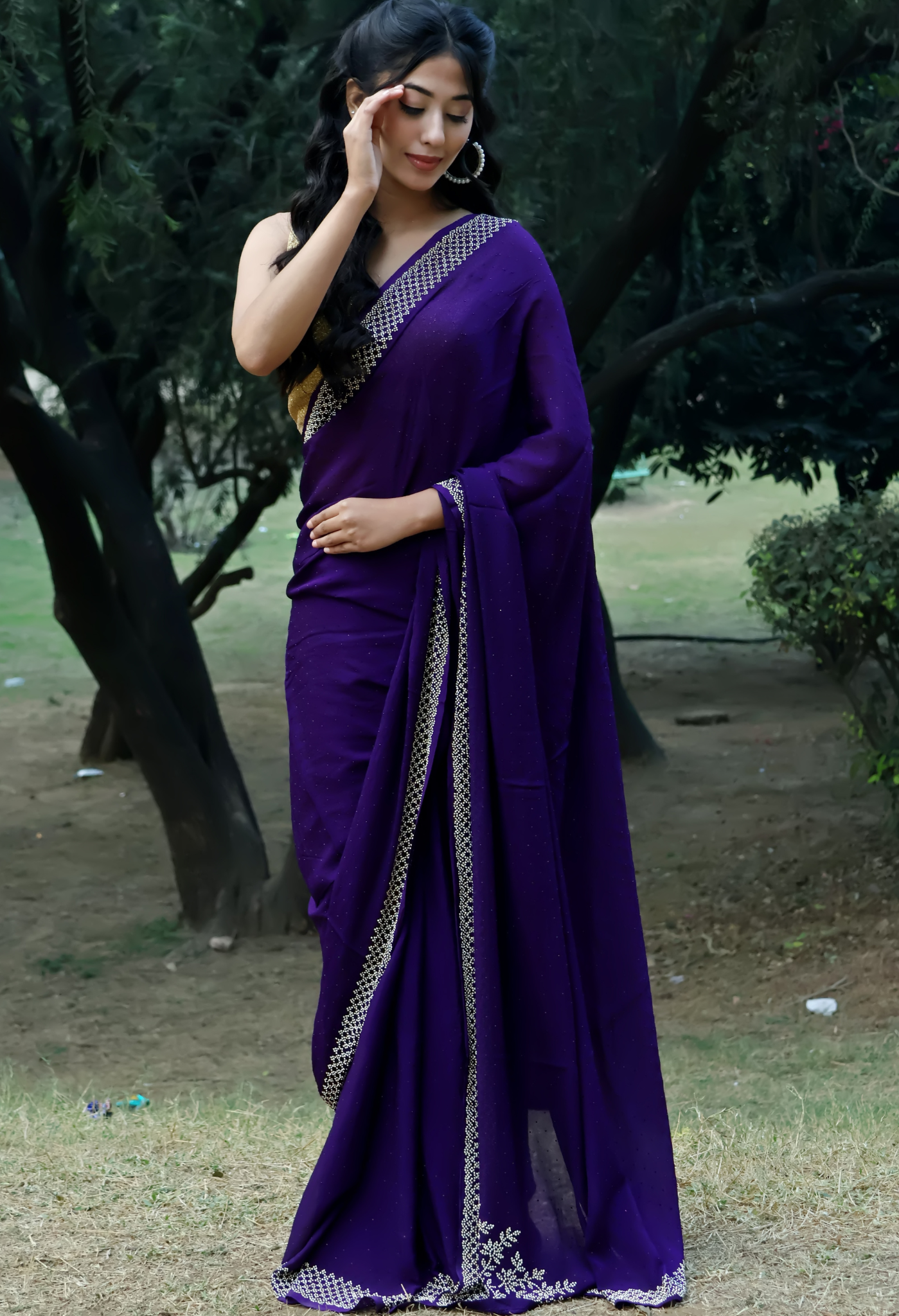 Elegant Rich Purple Swarovski Heavy Embellished chiffon leheriya saree for festive wear, trousseau saree, or farewell saree for timeless pre-wedding collection looks.
