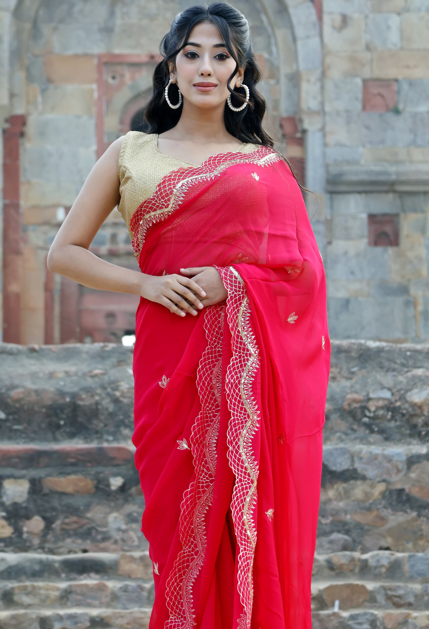 Brink Red Embroidered chiffon saree styled as festive wear, daily wear saree, and party wear saree, a versatile trousseau saree for weddings.