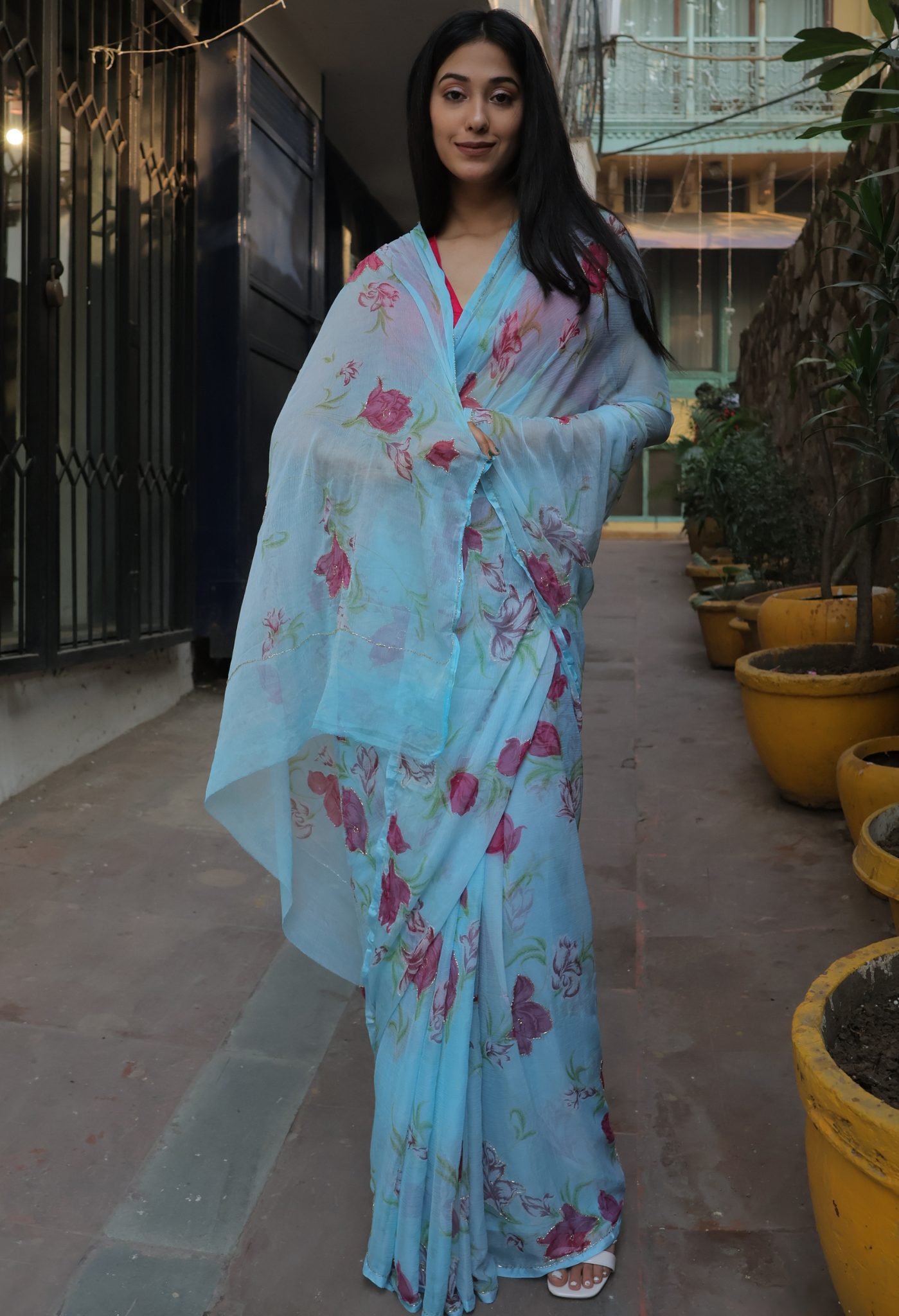 Baby Blue Floral Printed chiffon leheriya saree for festive wear, trousseau saree, or farewell saree for timeless pre-wedding collection looks.