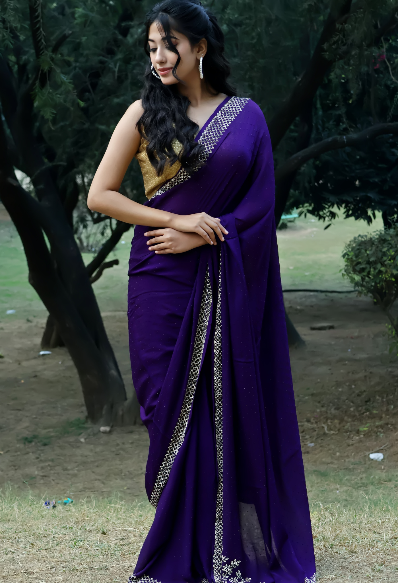 Elegant Rich Purple Swarovski Heavy Embellished chiffon leheriya saree for festive wear, trousseau saree, or farewell saree for timeless pre-wedding collection looks.