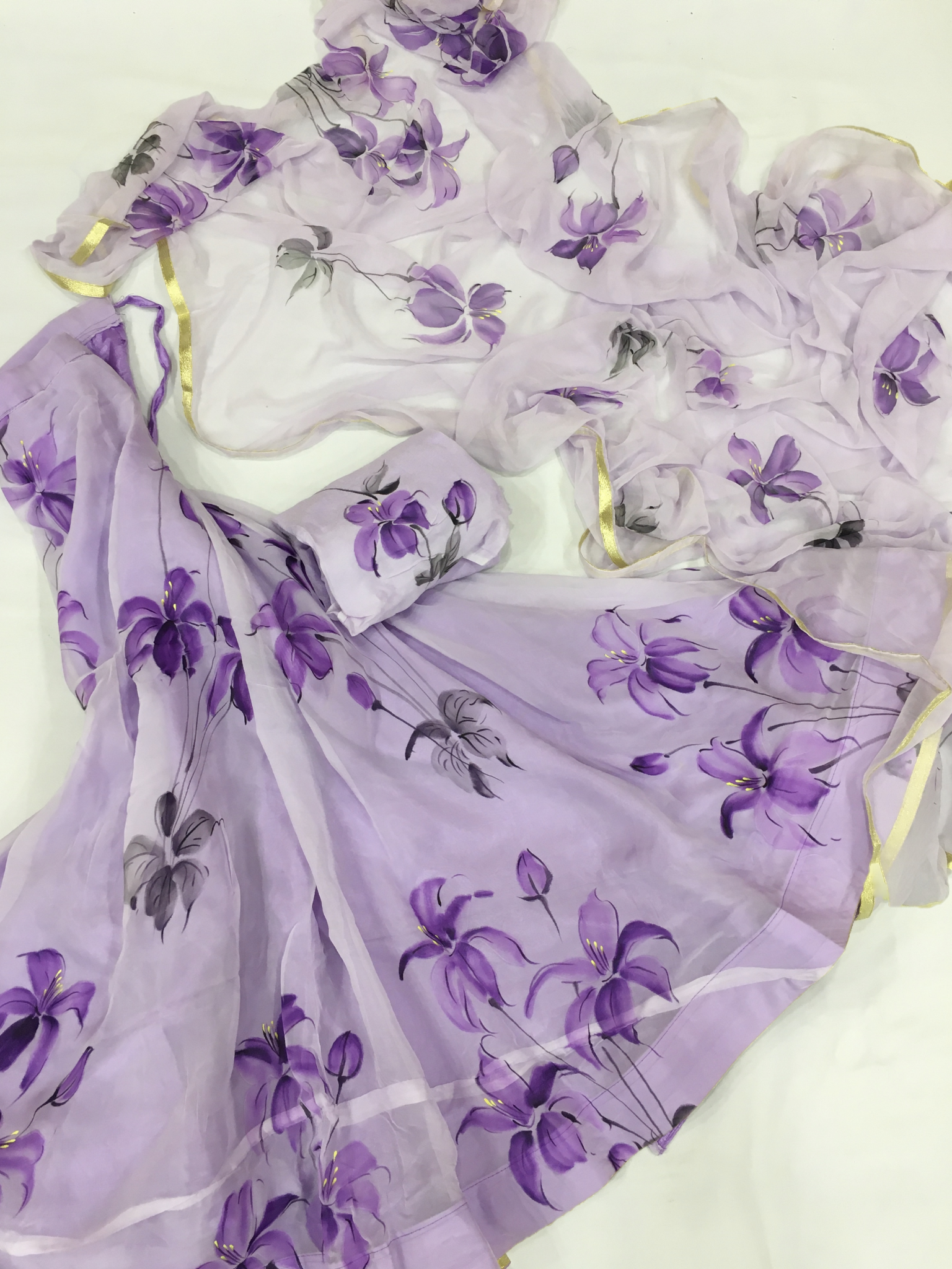 Timeless purple chiffon saree with subtle leheriya appeal; versatile daily wear saree and elegant trousseau saree.