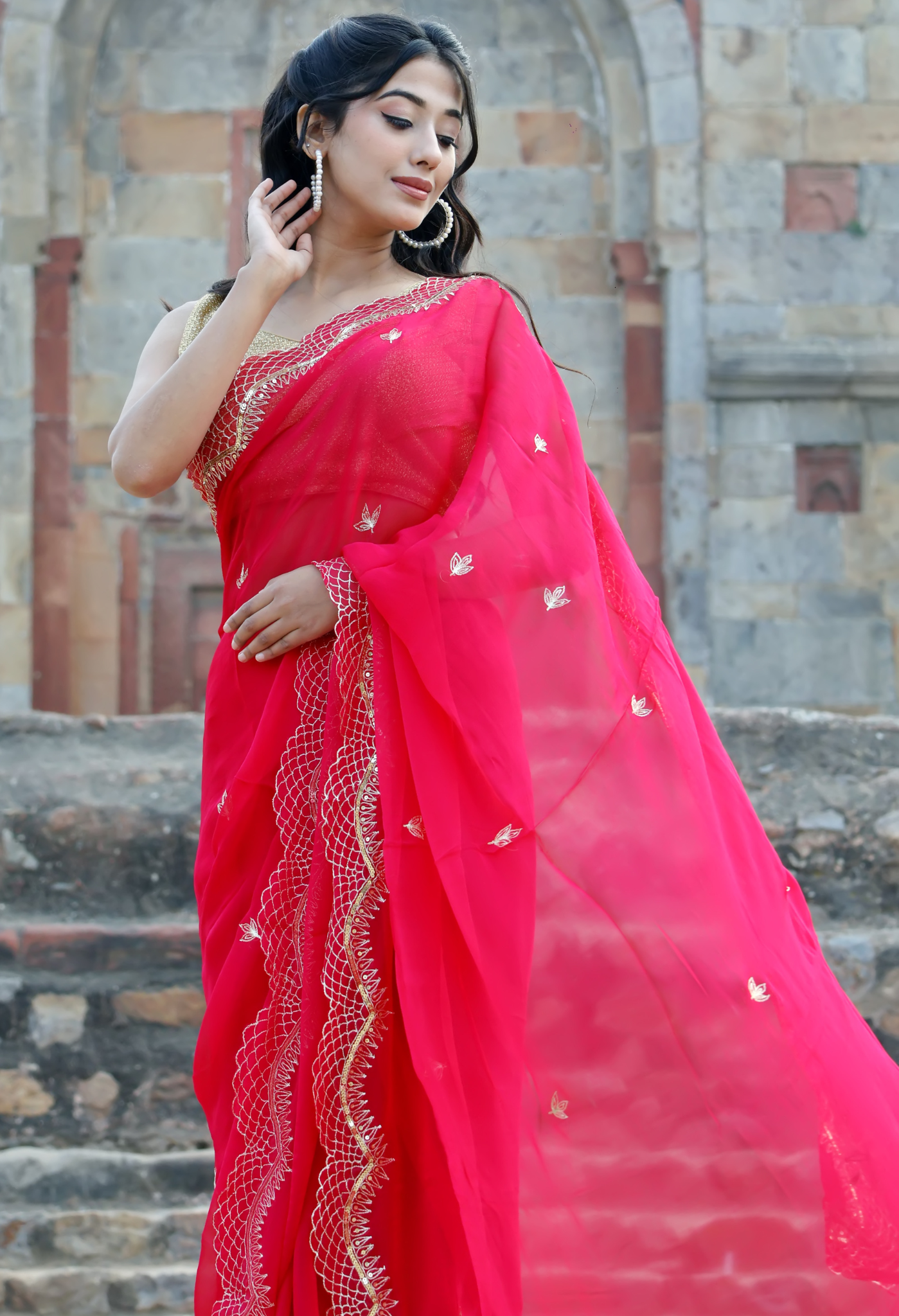Brink Red Embroidered chiffon saree styled as festive wear, daily wear saree, and party wear saree, a versatile trousseau saree for weddings.