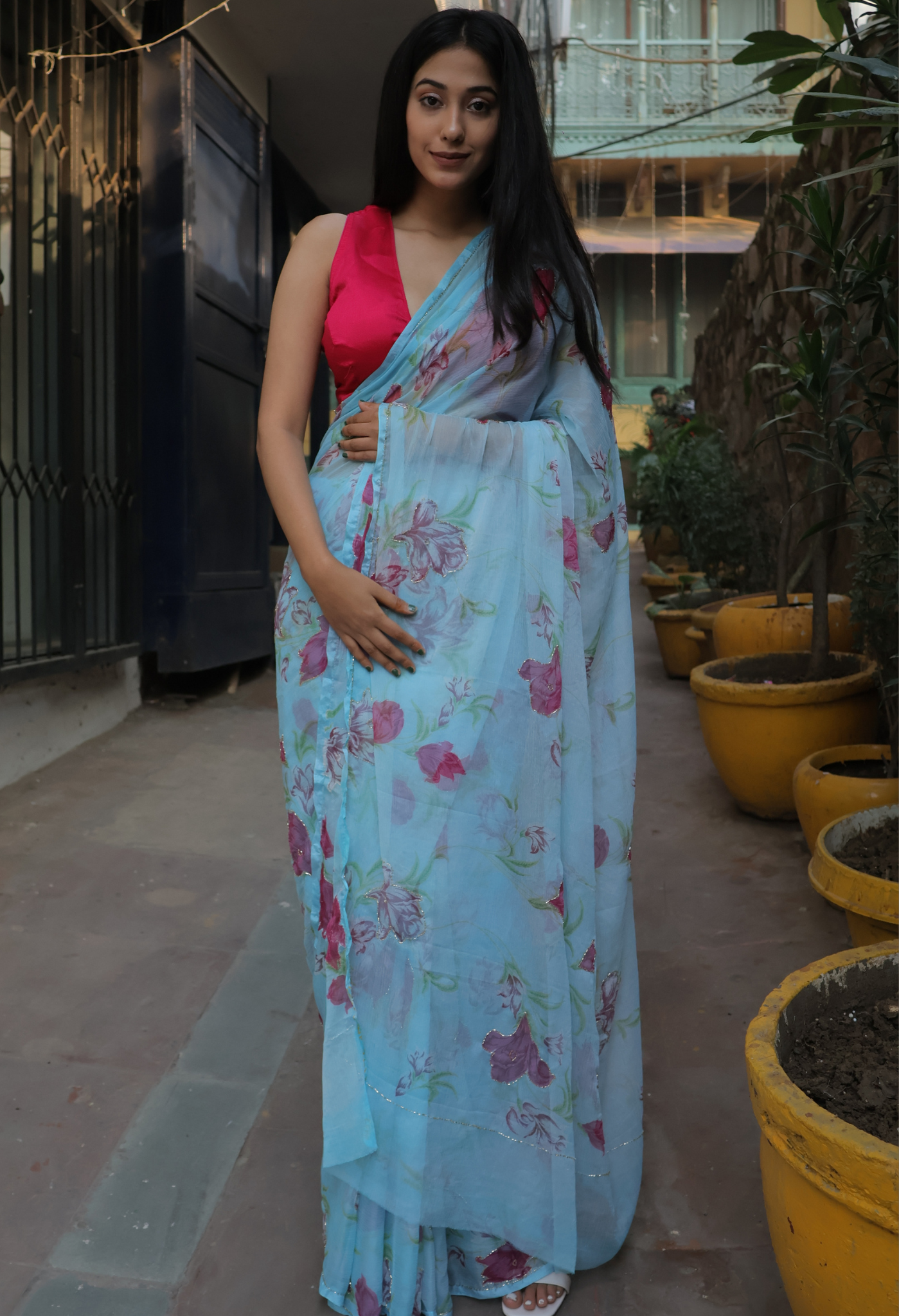 Baby Blue Floral Printed chiffon leheriya saree for festive wear, trousseau saree, or farewell saree for timeless pre-wedding collection looks.