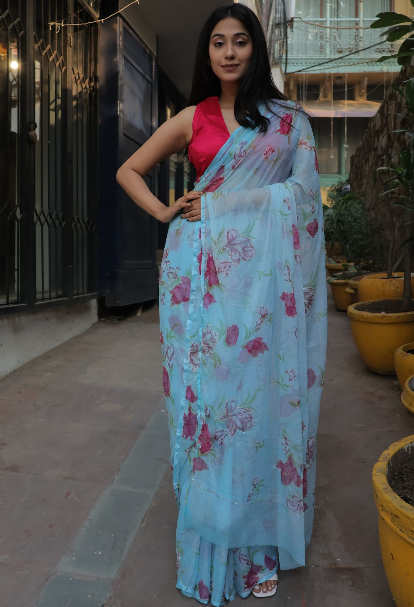 Baby Blue Floral Printed chiffon leheriya saree for festive wear, trousseau saree, or farewell saree for timeless pre-wedding collection looks.