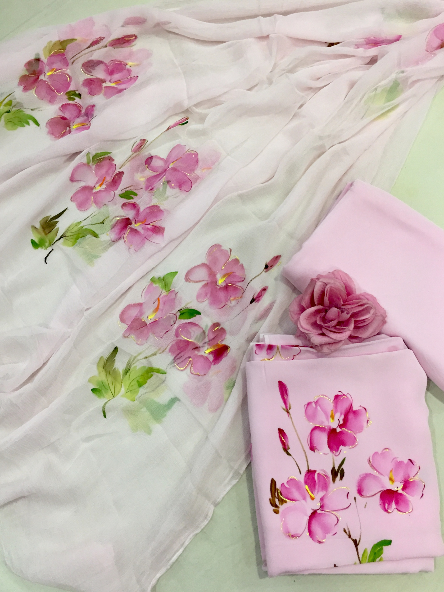 Chic chiffon pink saree balancing modern pre-wedding collection vibe with traditional festive wear elegance.