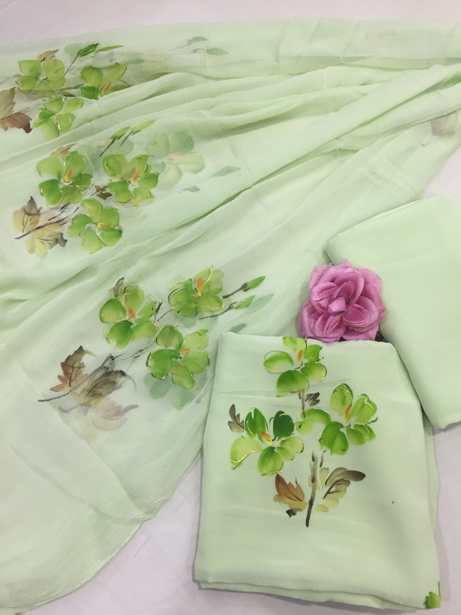 Handcrafted green chiffon saree suitable for farewell saree styling, festive wear saree, and graceful casual wear.