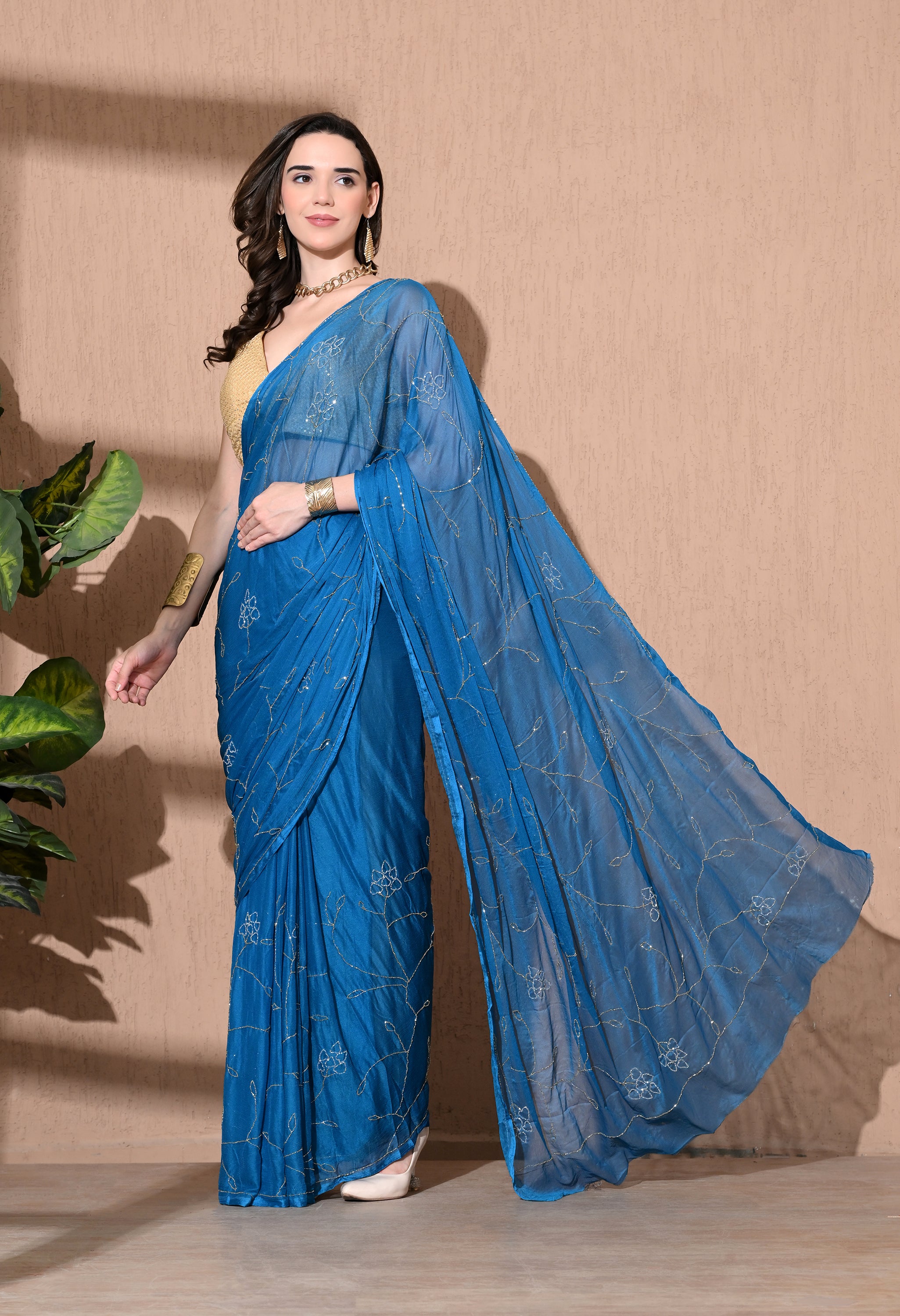 Sophisticated chiffon saree designed for festive wear, pre-wedding collection, versatile as party wear saree and trousseau saree.