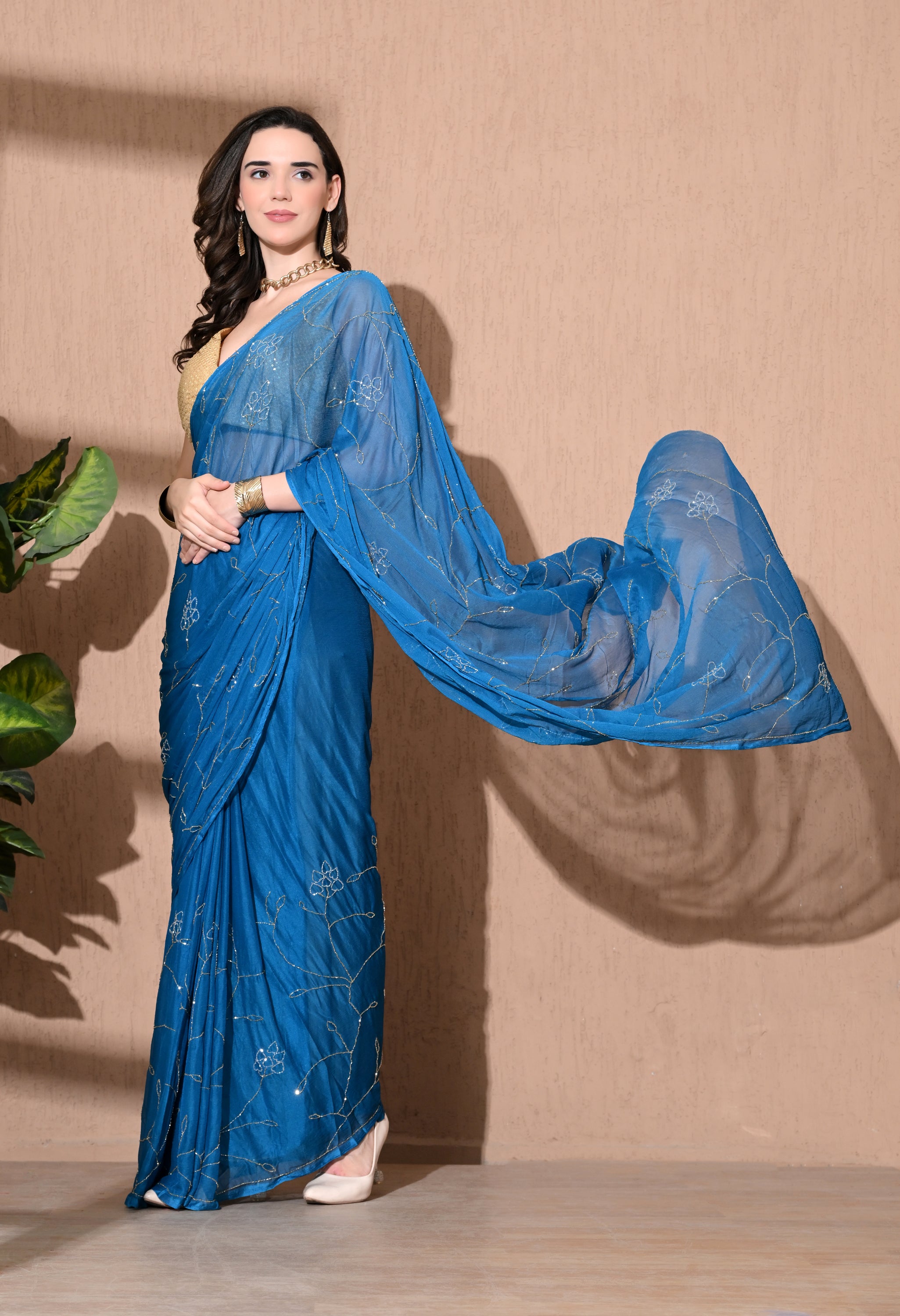 Sophisticated chiffon saree designed for festive wear, pre-wedding collection, versatile as party wear saree and trousseau saree.