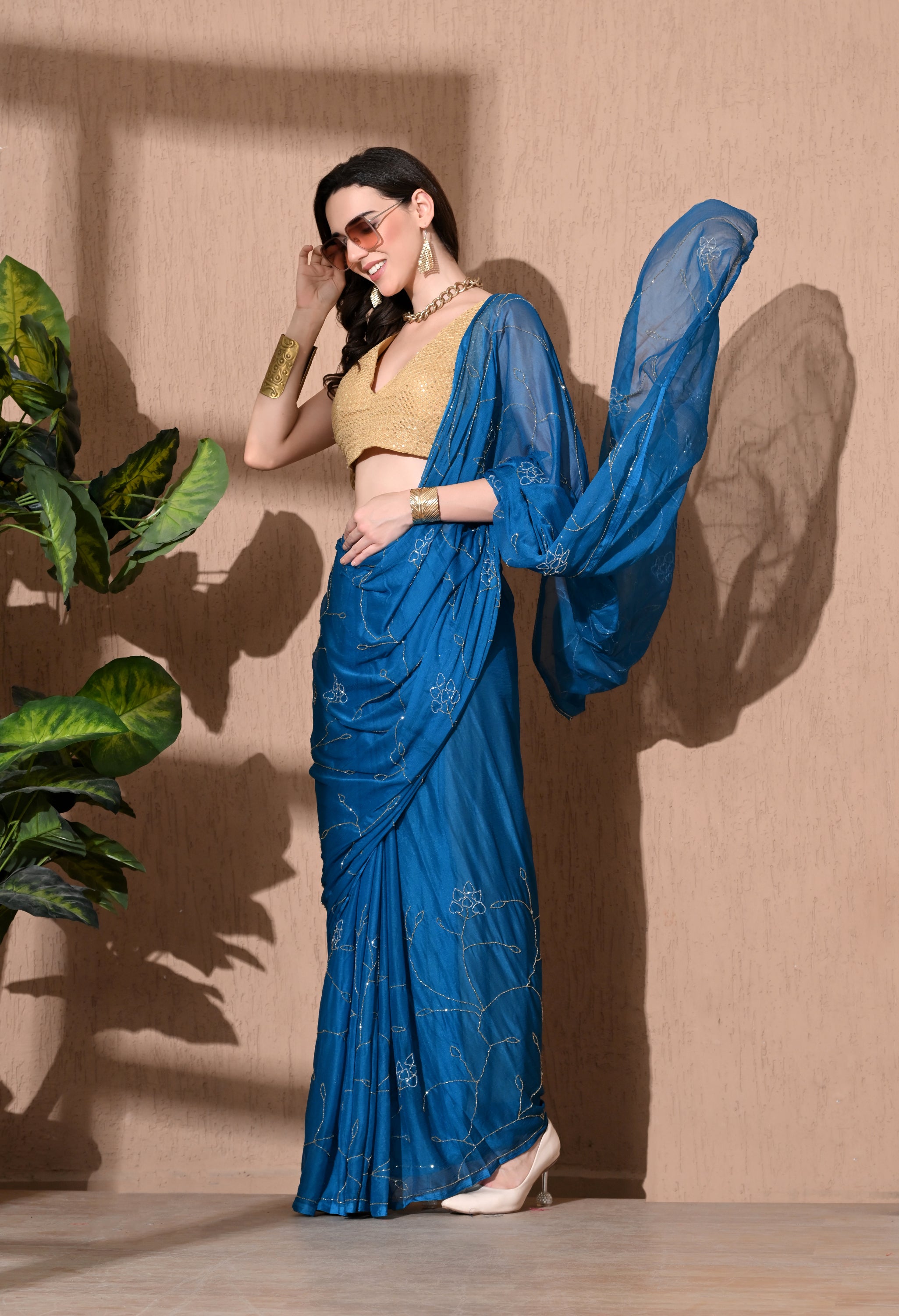 Sophisticated chiffon saree designed for festive wear, pre-wedding collection, versatile as party wear saree and trousseau saree.