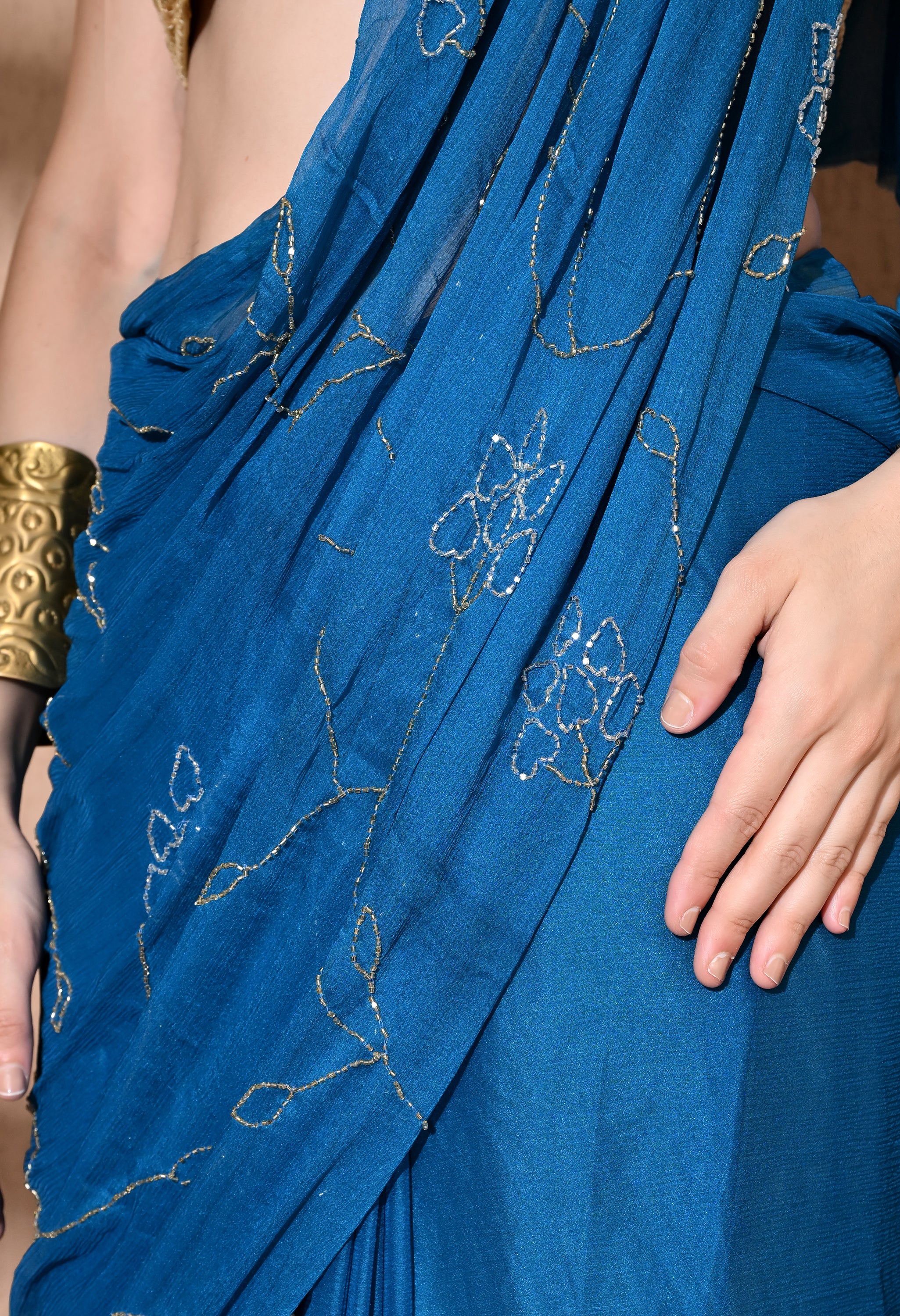 Sophisticated chiffon saree designed for festive wear, pre-wedding collection, versatile as party wear saree and trousseau saree.