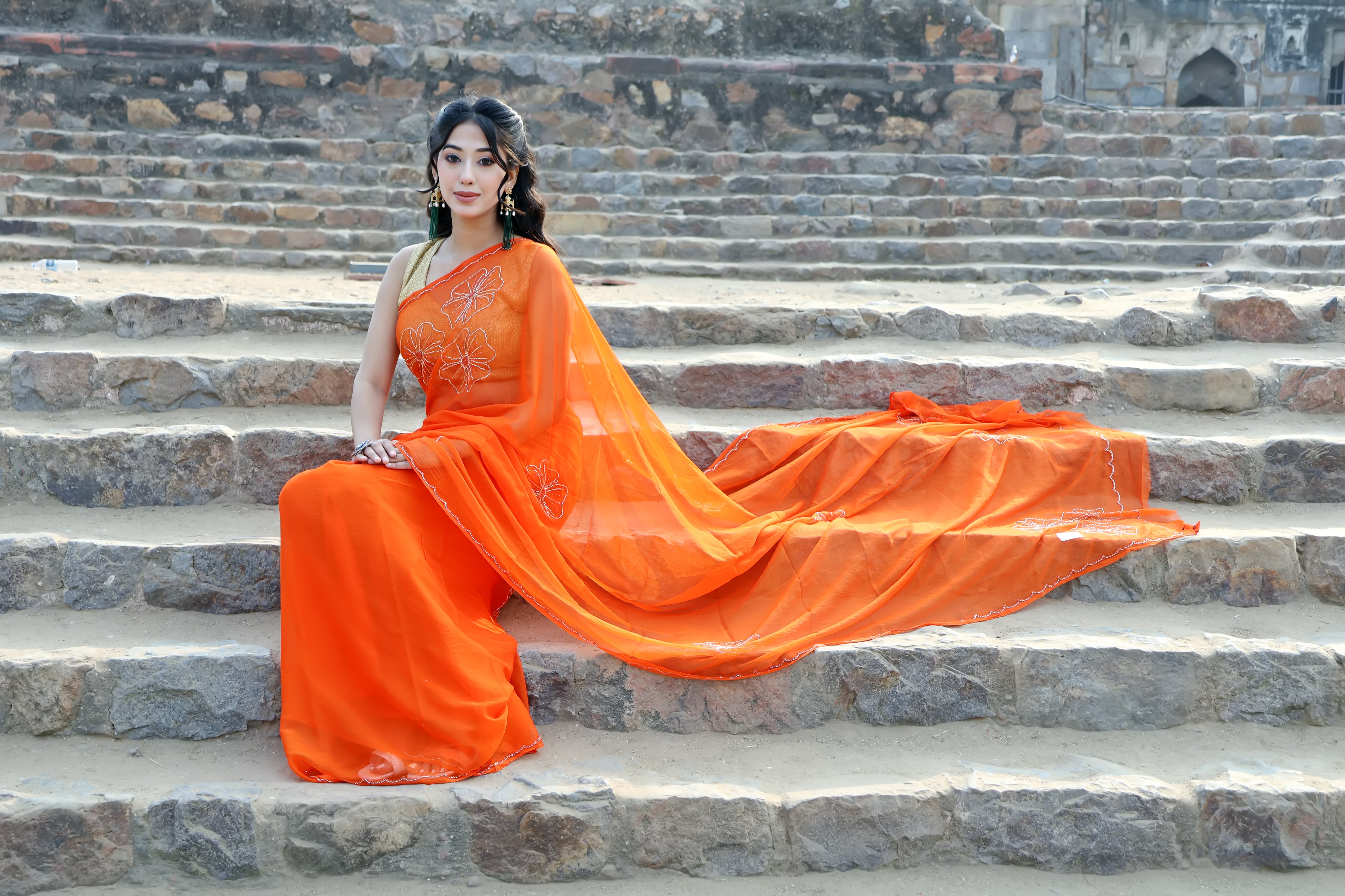 Elegant Princeton Orange Embellished chiffon leheriya saree for festive wear, trousseau saree, or farewell saree for timeless pre-wedding collection looks.